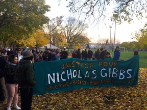 More than 100 people gather in Montreal's Trenholme Park on Sunday, Nov. 4, 2018, in a rally honouring Nicholas Gibbs, shot and killed by Montreal police in August.