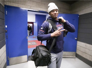 Quarterback Antonio Pipkin slings a bag over his shoulder on his way out of the locker room as Alouettes players cleaned out their lockers at the Olympic Stadium in Montreal on Sunday, Nov. 4, 2018.