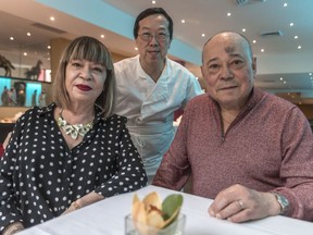 George and Eva Lau, the brother-sister team who own L'Orchidee de Chine, with chef Kwok Itkit Kiu, centre, in Montreal Nov. 6, 2018. The restaurant will close just after Christmas.