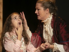 Actress Jennifer Martin who plays Kate Keller, right, and Melia Cressaty who plays Helen Keller, during dress rehearsal of The Miracle Worker from the Lakeshore Players Dorval theatre troupe.