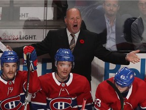 Canadiens coach Claude Julien argues with the referee following protest against goal by the Buffalo Sabres' Vladimir Sobotka during NHL game at the Bell Centre in Montreal on Nov. 8, 2018.