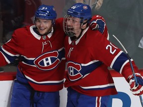 Montreal Canadiens' Nicolas Deslauriers, right, celebrates his short-handed goal with teammate Matthew Peca in Montreal on Nov. 8, 2018.