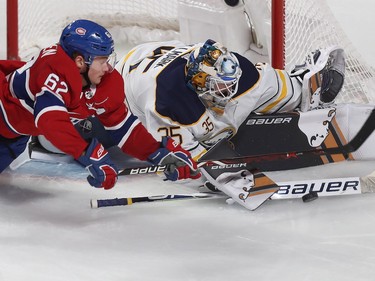 Artturi Lehkonen tries to get to the puck in front of Buffalo Sabres goaltender Linus Ullmark, during second-period action in Montreal on Thursday, Nov. 8, 2018.