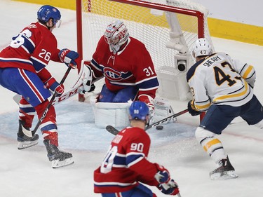 Buffalo Sabres left wing Conor Sheary scores on Carey Price with Jeff Petry and Tomas Tatar coming in on the play too late during first period in Montreal on Thursday, Nov. 8, 2018.