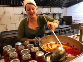Emma Cardarelli ladles red pepper salsa at Nora Gray. When mentor David McMillan encouraged her to open her own restaurant, she says, "it really made me feel like I could do anything."