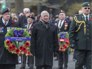 Lieutenant Governor of Quebec J. Michel Doyon, centre, placed a wreath at the Cenotaph at Place du Canada in Montreal on Sunday, Nov. 11, 2018, during Remembrance Day activities. The Cenotaph commemorates the First and Second World Wars and Korean War.