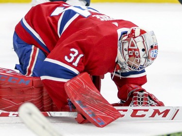 Canadiens Carey Price slams his stick on the ice after giving up game-winning goal to Washington Capitals Lars Eller during overtime of National Hockey League game in Montreal Monday November 19, 2018.