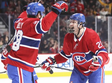 Mike Reilly, left, celebrates his goal against the Washington Capitals with Nicolas Deslauriers during first period at the Bell Centre on Monday, Nov. 19, 2018.
