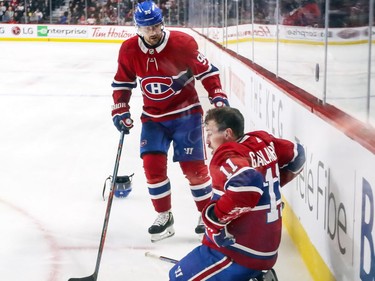 Tomas Tatar checks with teammate Brendan Gallagher after Gallagher was highsticked by Washington Capitals' Lars Eller during second period at the Bell Centre on Monday, Nov. 19, 2018.