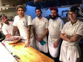 Danny Smiles, second from left, with staff at Le Bremner. When Chuck Hughes brought him on board at the Old Montreal restaurant, Smiles says, "I started working like a beast. ... This was my home. If I could have put a bed in here, I would have."