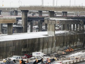 Chopped-up sections of elevated highway remain to be taken down in the middle of the Turcot construction project.