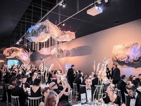 Guests enjoy the glow in the gorgeous banquet hall inspired by and dedicated to revered designer Marie Saint Pierre at the Montreal Museum of Fine Arts Ball.