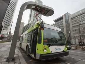 The STM fully electric bus, which is dedicated to the line 36 Monk, gets charged at the Square Victoria charging station on Friday, Nov. 30, 2018.