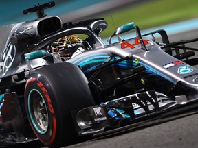 Lewis Hamilton, now a five-time champion, steers his Mercedes during Friday practice for the Abu Dhabi Grand Prix.
