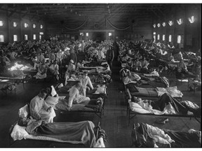 Influenza victims crowd into an emergency hospital near Fort Riley, Kansas in this 1918 photo. The 1918 Spanish flu pandemic killed at least 20 million people worldwide. it even affected the ability of soldier during the First World War to fight.