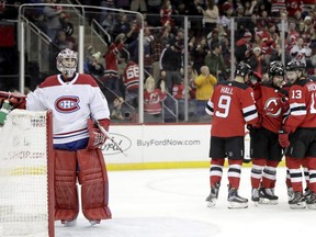 Canadiens goaltender attempts to collect himself after allowing a goal to Devils winger Taylor Hall during the second period Wednesday night.