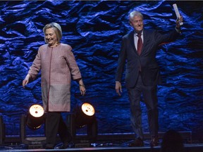 Former secretary of state Hillary Rodham Clinton and former President Bill Clinton appear in Montreal Nov. 28, 2018.