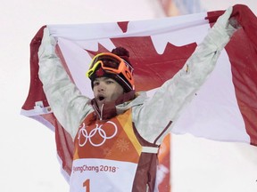 Quebecer Mikaël  Kingsbury celebrates winning his gold medal at the moguls finals at the Phoenix Snow Park at the Pyeongchang 2018 Winter Olympic Games in South Korea on Feb. 12, 2018. Just 26 years old, Kingsbury has already rewritten the moguls record book. He has no plans to slow down now that the new quadrennial is here.