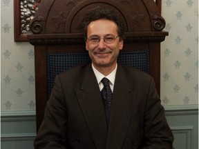 Denis Lavoie takes his place as the mayor of Chambly at a swearing-in ceremony at city hall in 2005.
