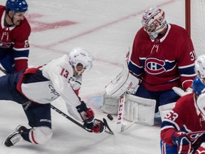 Washington Capitals left wing Jakub Vrana can get a good shot on Carey Price during first-period NHL action at the Bell Centre on Thursday, Nov.1, 2018.
