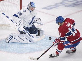 Canadiens' Max Domi moves in on Tampa Bay Lightning goaltender Andrei Vasilevskiy in Montreal on Saturday, Nov. 3, 2018.