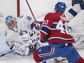 Tampa Bay Lightning goalie Andrei Vasilevskiy makes save on the Canadiens’ Joel Armia during first period of NHL game at the Bell Centre in Montreal on Nov. 3, 2018.