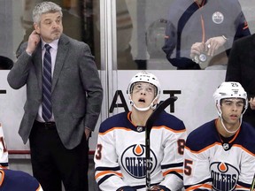 Following a rare season without any coach firings, NHL teams have been quick to drop axe early in 2018-19. Edmonton Oilers head coach Todd McLellan, left, watches his team during the second period of an NHL hockey game against the Chicago Blackhawks, in Chicago, Sunday, Jan. 7, 2018.