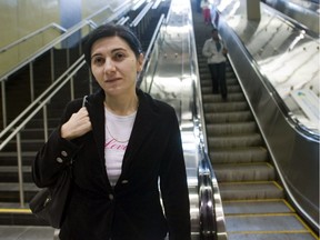 Bela Kosoian at the Montmorency métro station in Laval Sunday, May 17, 2009. She received two Montreal Municipal Court tickets, $420 in total including administration charges Wednesday, May 13, after she refused to touch the rubber handrail on the down escalator (on the right in the photo).