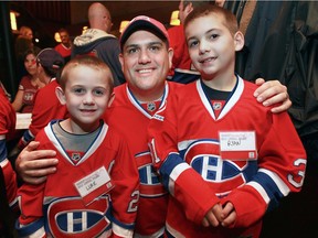 Eric Zeigenfuss brought his boys Luke, left, and Ryan from Philadelphia to the annual Hockey Inside/Out summit in Montreal in 2013 to watch the Canadiens play and get together with other Habs fans from across North America and beyond.