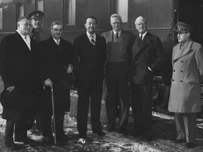 In 1951, John Wilson McConnell was in this party that accompanied Viscount Alexander, then governor-general, on an inspection of the Aluminum Company production facilities at Arvida. This picture was taken during a brief stopover at Quebec. Left to right are: the late Lieutenant-Governor Gaspard Fauteux; Viscount Alexander; R.E. Powell, chairman of the board of the Aluminum Company of Canada; Mrs. McConnell; and Col. Maurice de Rome, who was then officer commanding the Quebec Eastern Area.