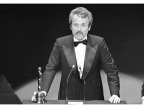 FILE - In this March 28, 1977 file photo, William Goldman accepts his Oscar at Academy Awards in Los Angeles, for screenplay from other medium for "All The President's Men." Goldman, the Oscar-winning screenplay writer of "Butch Cassidy and the Sundance Kid" and "All the President's Men" William Goldman died, Friday, Nov. 16, 2018. He was 87. (AP Photo, File)