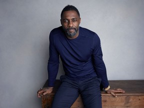 FILE - In this Jan. 21, 2018, file photo, actor-director Idris Elba poses for a portrait to promote his film "Yardie" at the Music Lodge during the Sundance Film Festival in Park City, Utah. On Monday, Nov. 5, 2018, Elba was named Sexiest Man Alive by People magazine.