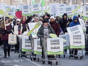 People attend a march in support of farmers and the farming industry in Montrea on Sunday, Nov. 18, 2018.