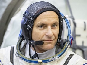 Canadian Space Agency astronaut David Saint-Jacques speaks to media Nov. 14, 2018, before the final preflight test in a mock-up of a Soyuz space craft in Star City, outside Moscow.