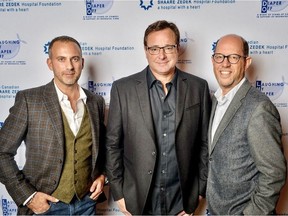 Event co-chairs and founders Dan Wise (left) and Michael Eliesen (right) snapped with headliner Bob Saget at the Corona Theatre for the inaugural Laughing My Diaper Off fundraiser, a benefit for the new Montreal chapter of the Canadian Shaare Zedek Hospital Foundation.