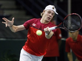 Canada's Denis Shapovalov returns to India's Yuki Bhambri during Davis Cup singles tennis in Edmonton, Alta., on Friday, September 15, 2017.