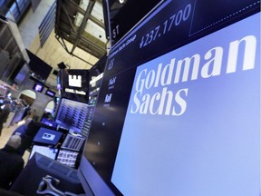 The logo for Goldman Sachs appears above a trading post on the floor of the New York Stock Exchange, Tuesday, Dec. 13, 2016.