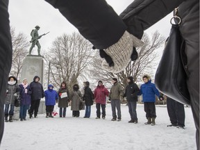 People take part in an inter-faith solidarity rally in support of Quebec's Muslim community at Stoney Point Park in Montreal on Sunday, February 5, 2017.