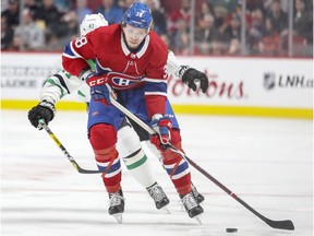 Canadiens forward Nikita Scherbak skates with the puck away from Dallas Stars' Alexander Radulov during third period of NHL game at the Bell Centre in Montreal on March 13, 2018.