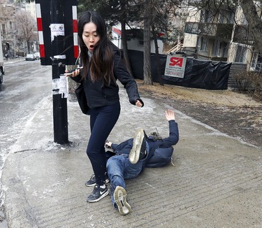 On the morning of April 16, Montreal was hit with freezing rain, so I headed to the corner of Dr. Penfield Ave. and Peel St. to look for pictures of pedestrians navigating that notoriously slippery intersection. I didn't have to wait long before Xinkai Xu lost his footing and starting sliding down Peel on his back, almost taking out an unsuspecting woman waiting to cross the street.