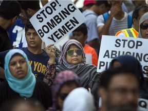 Protests against the government of Saudi Arabia at the Human Rights Monument in Ottawa in 2017.