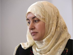 Quebec's highest court has ruled a woman who was denied justice three years ago after a judge ordered her to remove her hijab was entitled to be heard by the court. Rania El-Alloul takes part in a news conference in Montreal, Friday, March 27, 2015. In 2015, Judge Eliana Marengo refused to hear a case involving El-Alloul's impounded car because El-Alloul refused to remove her Islamic head scarf in the courtroom.