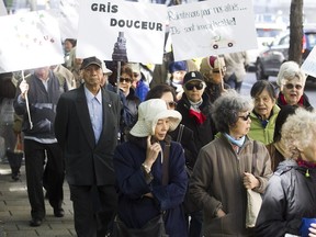 Seniors in Montreal mark the United Nations International Day of Older Persons in Victoria Square. The percentage of Quebec's population 65 or older stands at 18.5.