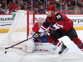 Canadiens goaltender Carey Price keeps a close eye on Coyotes' Christian Fischer during first-period action in Glendale, Ariz., Thursday night.