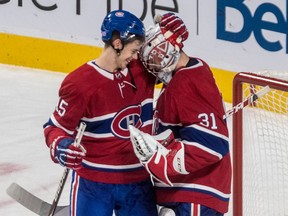 Canadiens centre Jesperi Kotkaniemi  congratulates goalie Carey Price after beating the Washington Capitals 6-4 during NHL game at the Bell Centre in Montreal on Nov. 1, 2018.