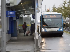 Passengers board the 139 bus at the  bus rapid transit terminal at Pie-IX Blvd. and Amos St. in 2018.