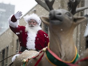 Santa waves to the crowd in Montreal in 2018.