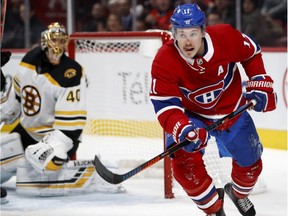 Canadiens right-wing Brendan Gallagher sprints away from Boston Bruins goaltender Tuukka Rask in Montreal on Nov. 24, 2018.