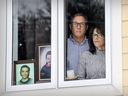 Larry Fairholm and ex-wife Tracy Wing in the front window of her home in Lac-Brome, where she keeps photos of their son, Riley Fairholm.