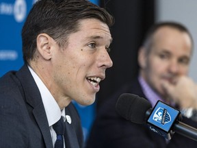 Montreal Impact president Joey Saputo announced the appointment of Patrick Leduc, left, as the administrative director of soccer operations for the club at a news conference at Centre Nutrilait in Montreal on Dec. 6, 2018.